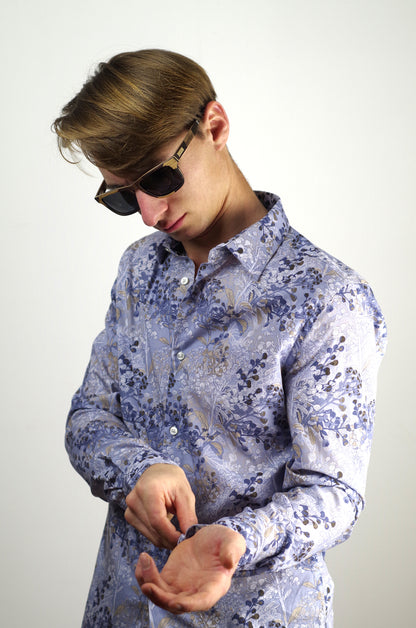 personne portant des lunettes de soleil en bois psir la bordelaise